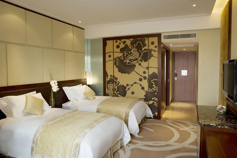 New World Dalian Hotel Habitación foto